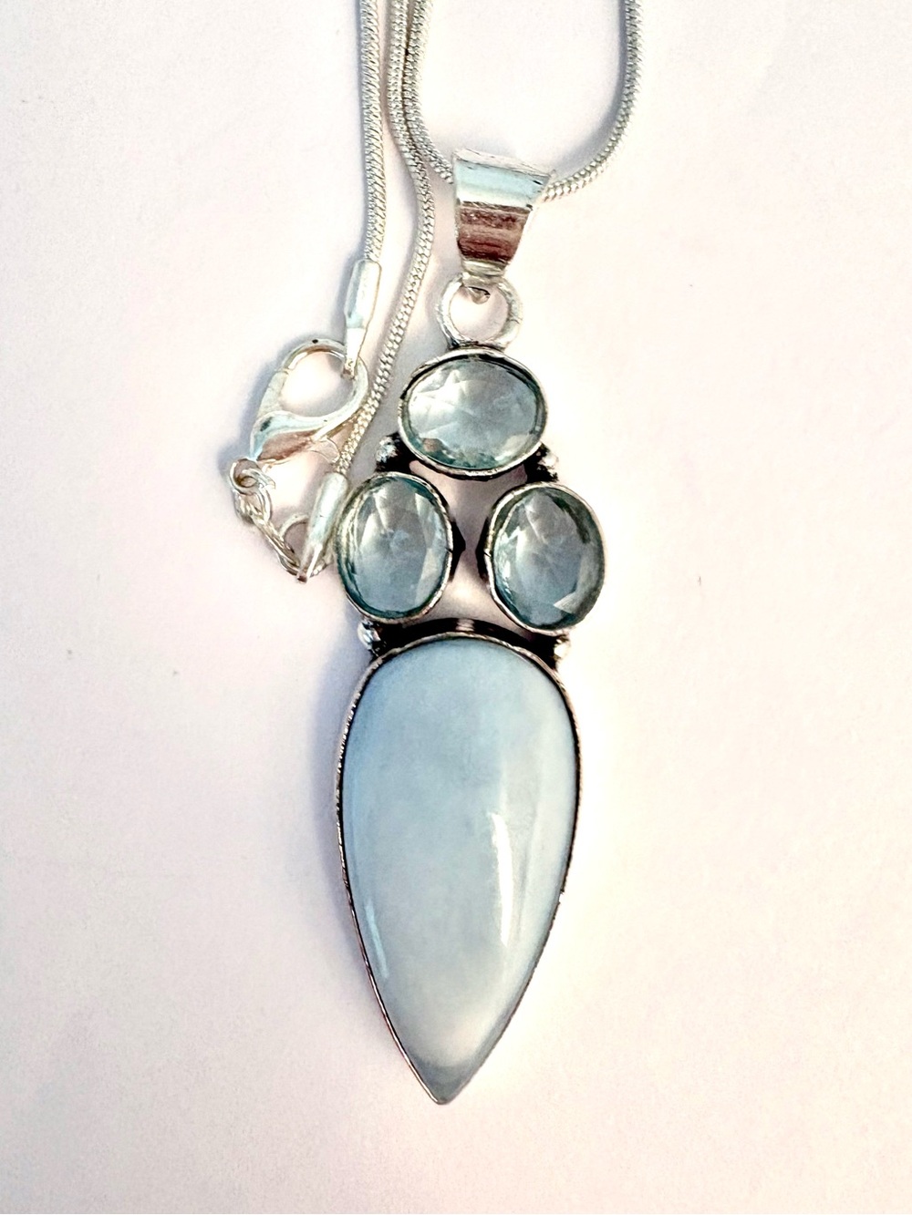 Beautiful, 2 1/2 inch, Owhyee Blue Opal and Blue Topaz pendant on a silver chain